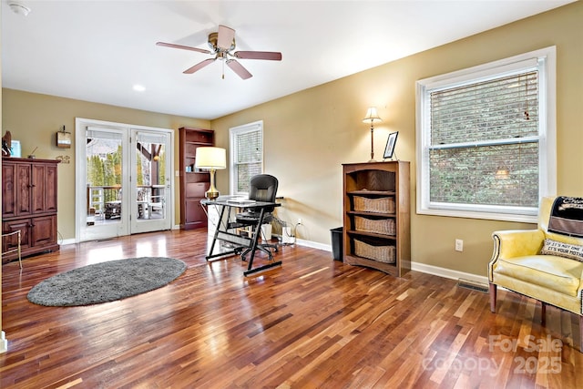 home office featuring ceiling fan and hardwood / wood-style floors