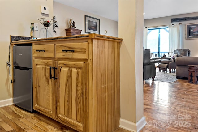 interior details with hardwood / wood-style flooring