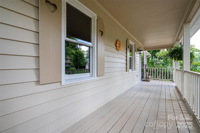 deck with covered porch