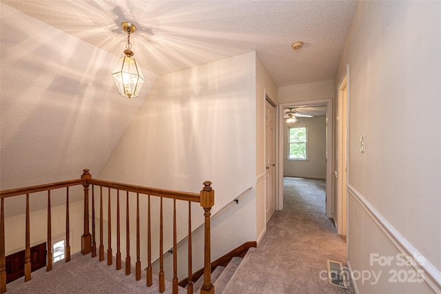 hallway with carpet