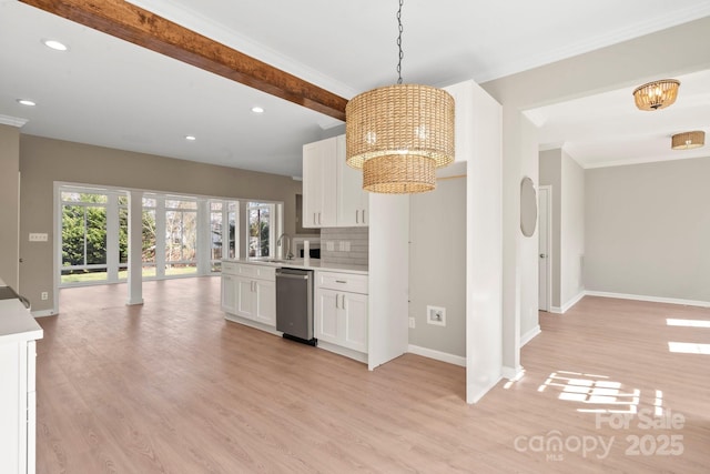 kitchen with light wood finished floors, white cabinetry, and an inviting chandelier