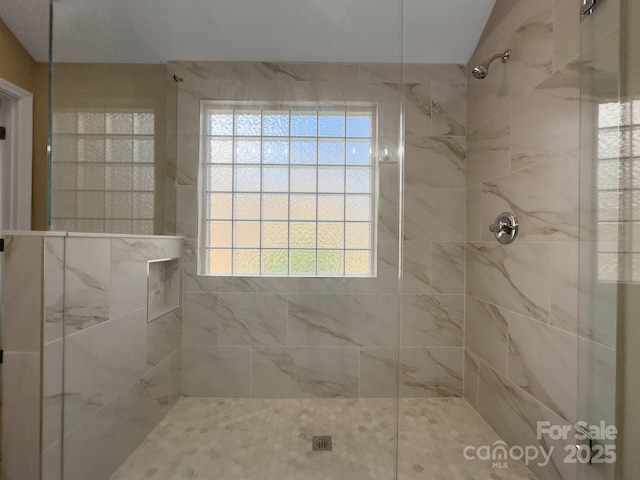 full bathroom with a shower stall