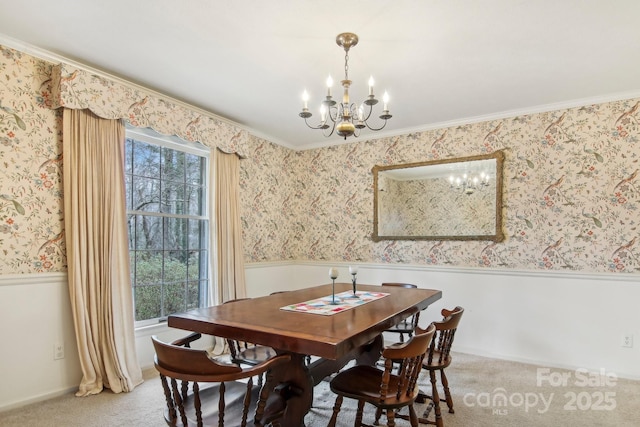 dining space featuring carpet flooring and an inviting chandelier