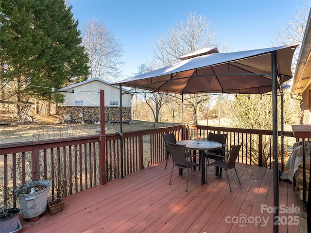 wooden deck with a gazebo