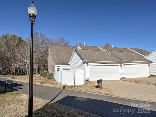 view of property exterior featuring a garage