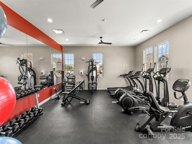 gym featuring plenty of natural light, baseboards, a ceiling fan, and recessed lighting