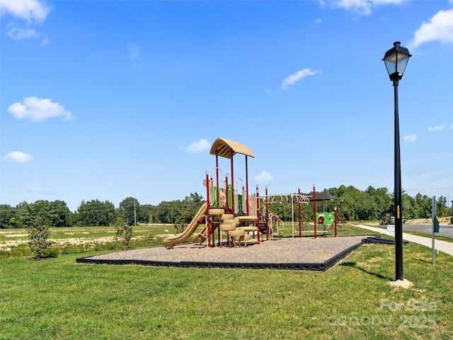 communal playground with a lawn