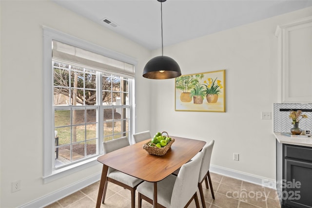 view of tiled dining space