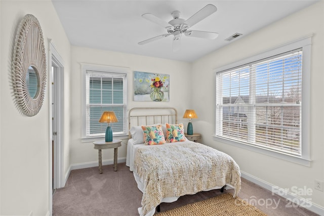 bedroom with ceiling fan and carpet