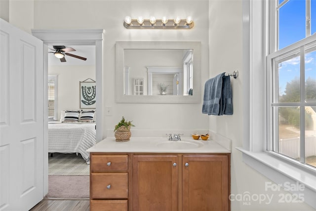 bathroom featuring vanity and ceiling fan