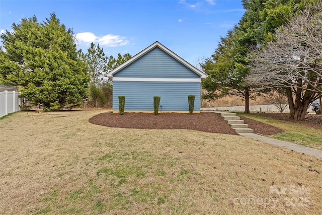 view of property exterior featuring a yard