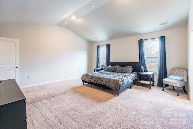 bedroom featuring lofted ceiling and carpet floors