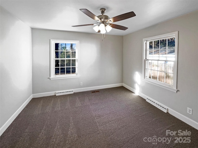 carpeted empty room with ceiling fan