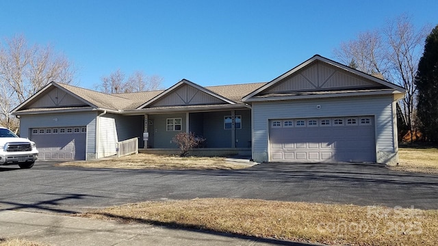 ranch-style house featuring a garage