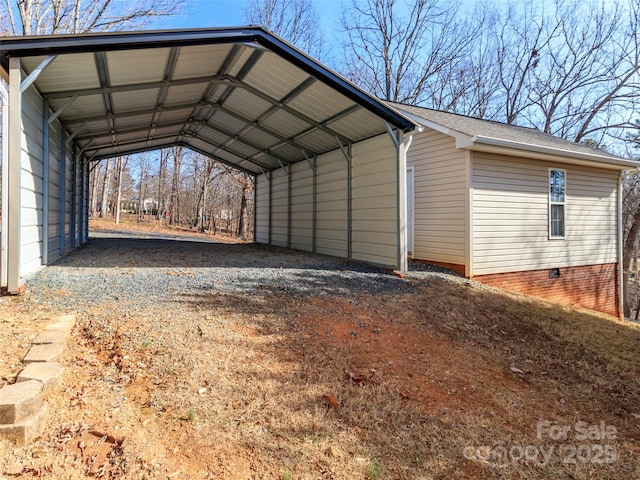 exterior space with a carport