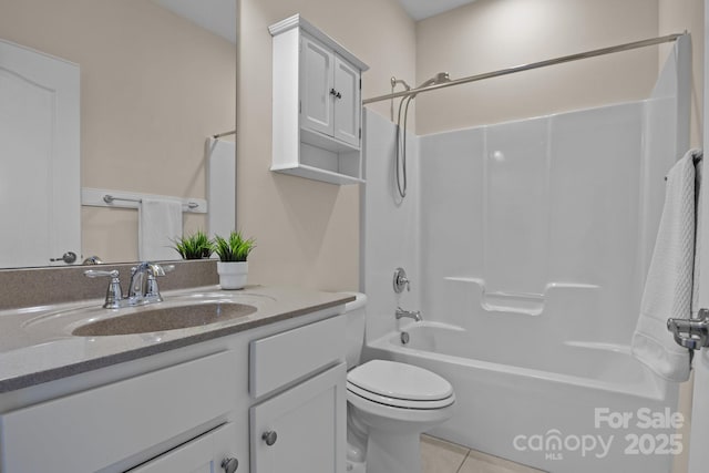 full bath featuring toilet, tile patterned flooring, vanity, and bathing tub / shower combination