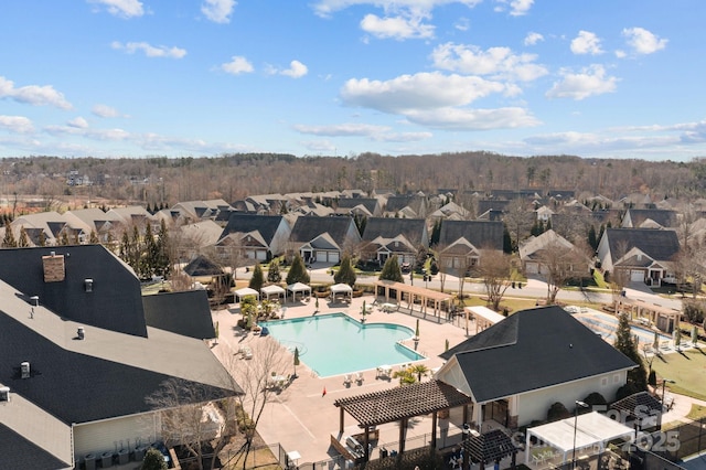 birds eye view of property with a residential view