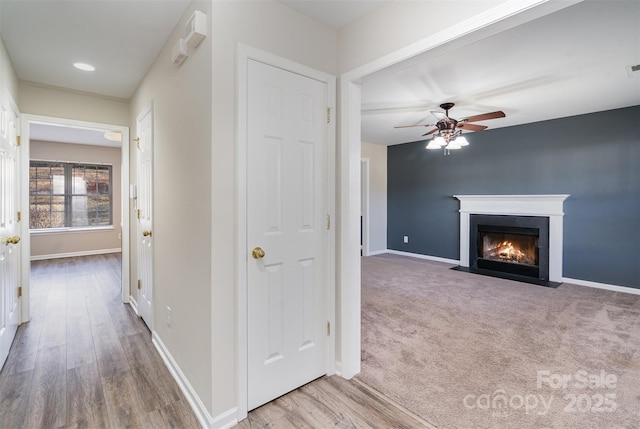 hallway with light wood-type flooring