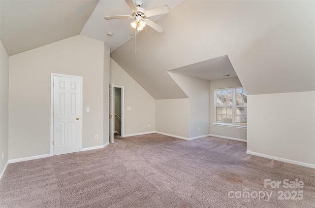 additional living space with lofted ceiling, ceiling fan, and carpet