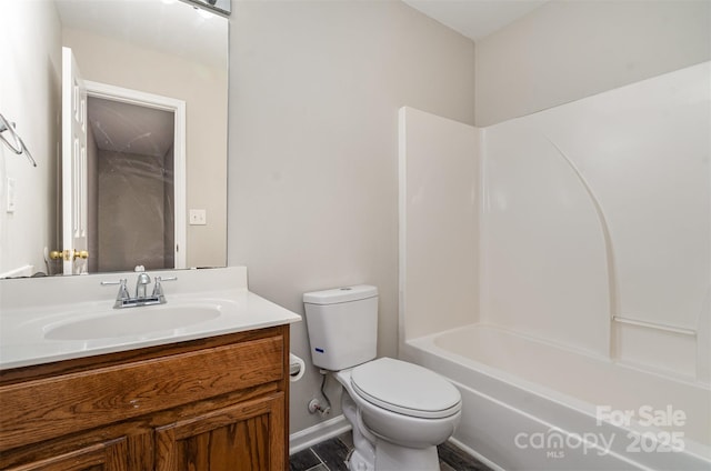 full bathroom with vanity, tub / shower combination, and toilet