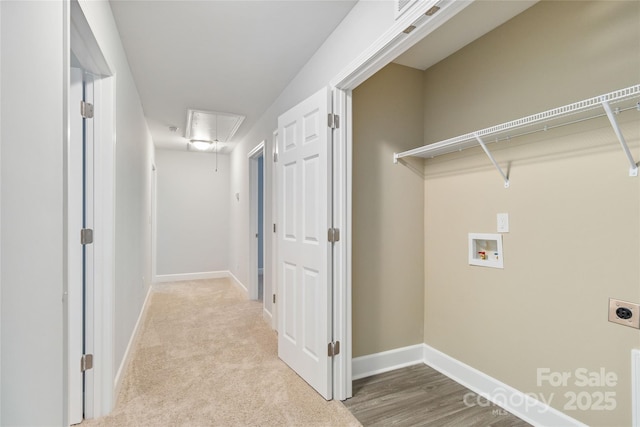 clothes washing area with hookup for a washing machine and hookup for an electric dryer