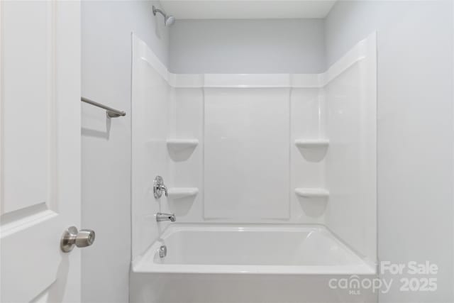 bathroom featuring bathing tub / shower combination