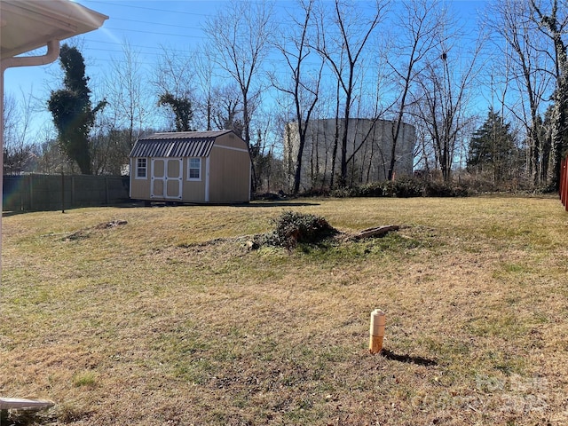 view of yard with a storage shed