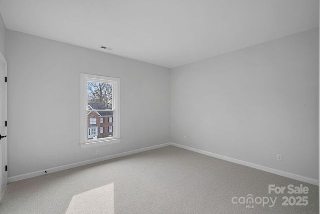 empty room with carpet floors