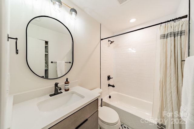 bathroom with toilet, recessed lighting, shower / bath combination with curtain, and vanity