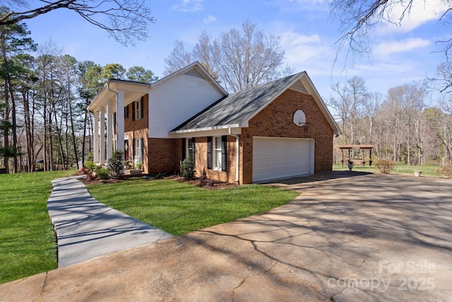 view of property exterior featuring driveway, a yard, a garage, and brick siding