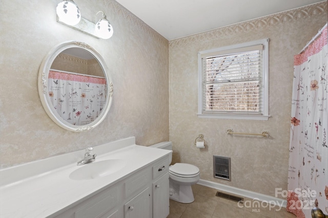 full bathroom featuring toilet, tile patterned flooring, visible vents, and vanity