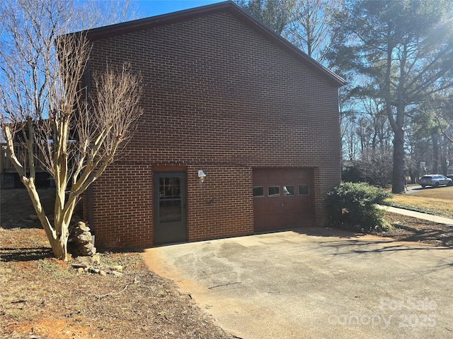 view of property exterior with a garage