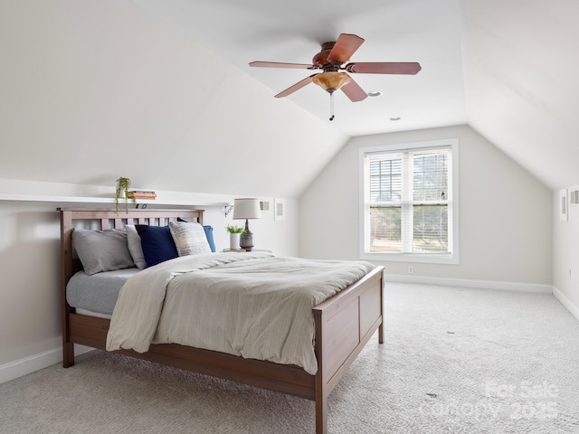 carpeted bedroom with lofted ceiling and ceiling fan