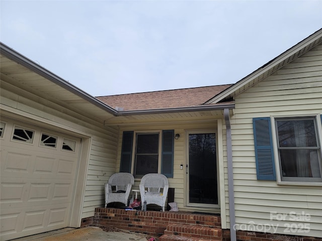 entrance to property featuring a garage