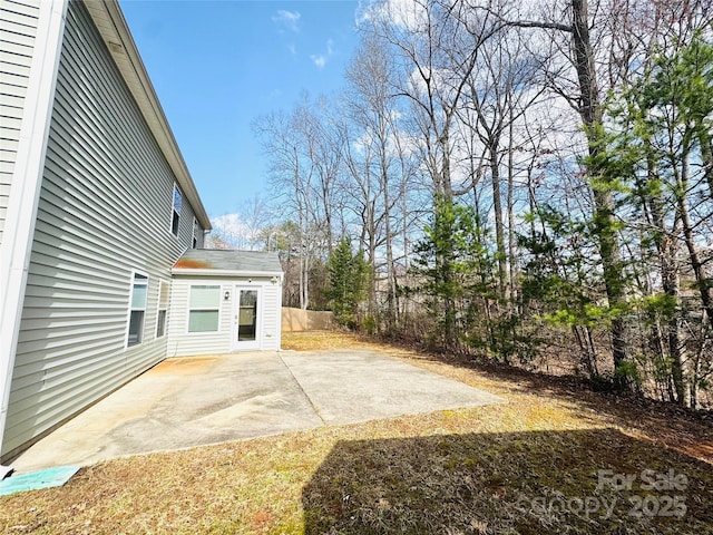 view of yard with a patio area and fence