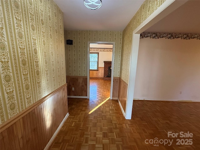 hall with dark parquet floors