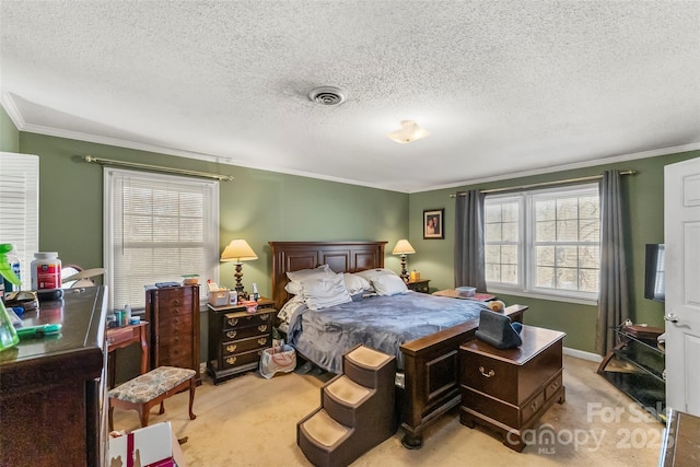 carpeted bedroom featuring ornamental molding and a textured ceiling