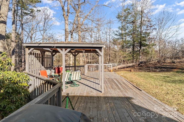 wooden deck with a lawn