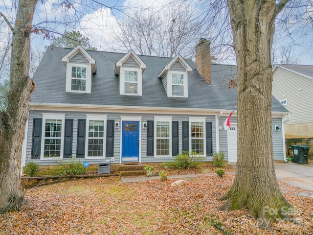 view of new england style home