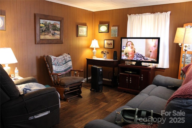 living room featuring crown molding and dark wood-type flooring