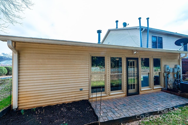 back of house featuring a patio