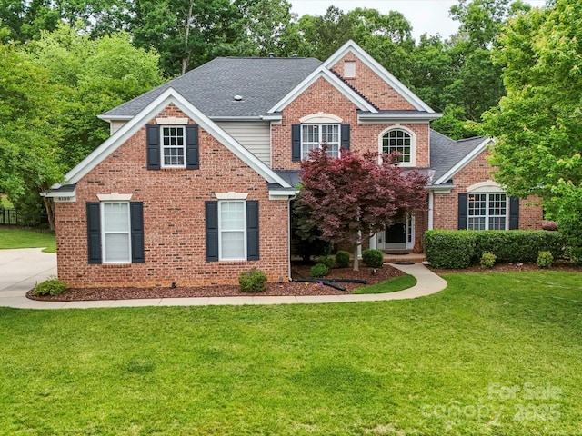 view of front of house with a front lawn