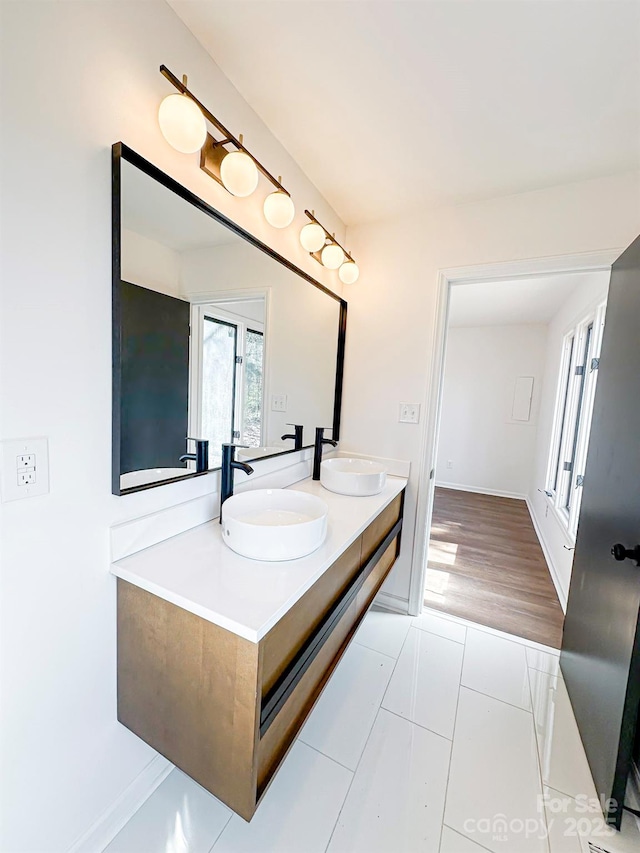 bathroom with vanity and tile patterned flooring