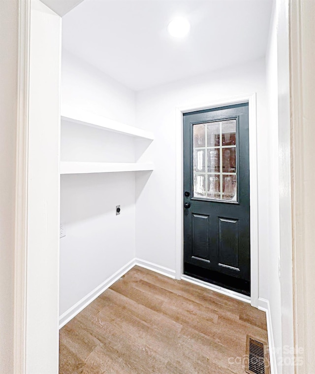 laundry area with electric dryer hookup