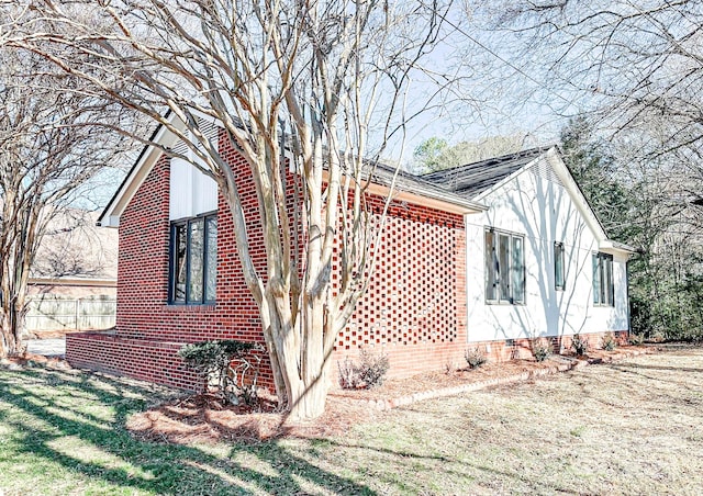 view of property exterior featuring a yard