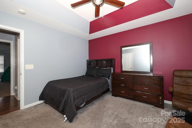 bedroom featuring ceiling fan and light carpet