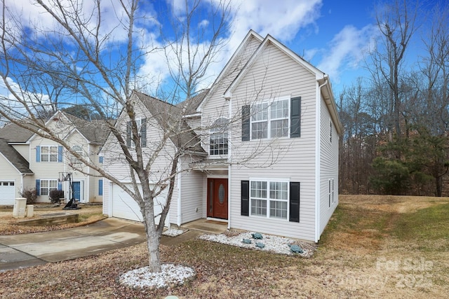 front of property featuring a garage