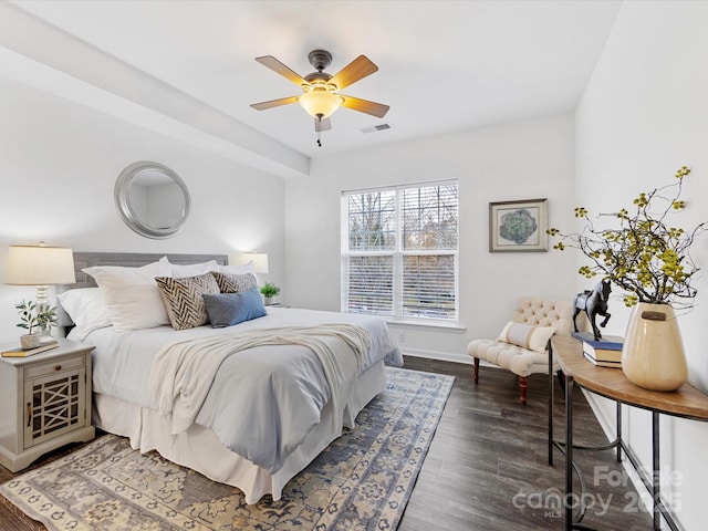 bedroom featuring ceiling fan and dark hardwood / wood-style floors