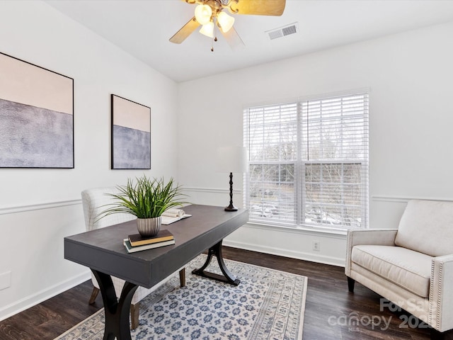 office area featuring dark wood-type flooring and ceiling fan