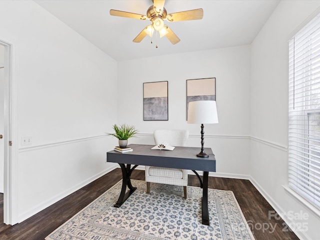 office space featuring dark wood-type flooring and ceiling fan